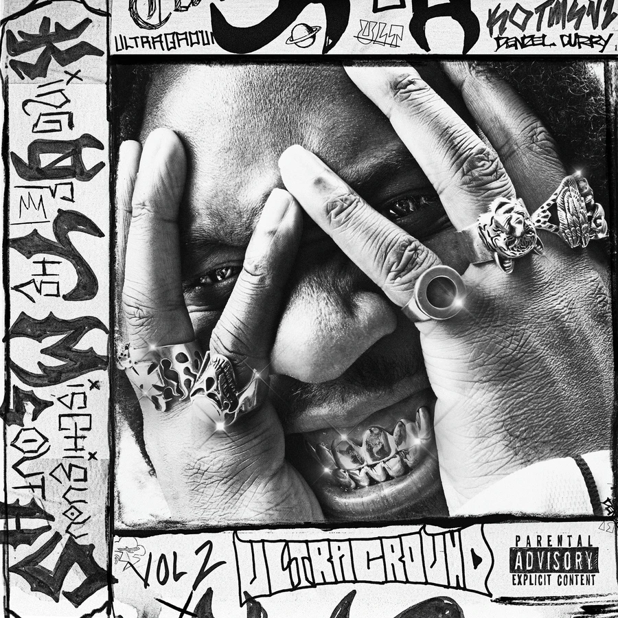 Denzel Curry wears a grille and holds his hands in front of his face, surrounded by scribbled song titles.